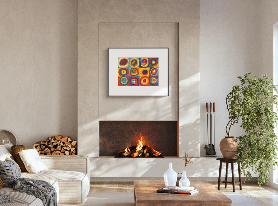 Color E-Ink frame displaying artwork above a fireplace in a hotel suite lounge