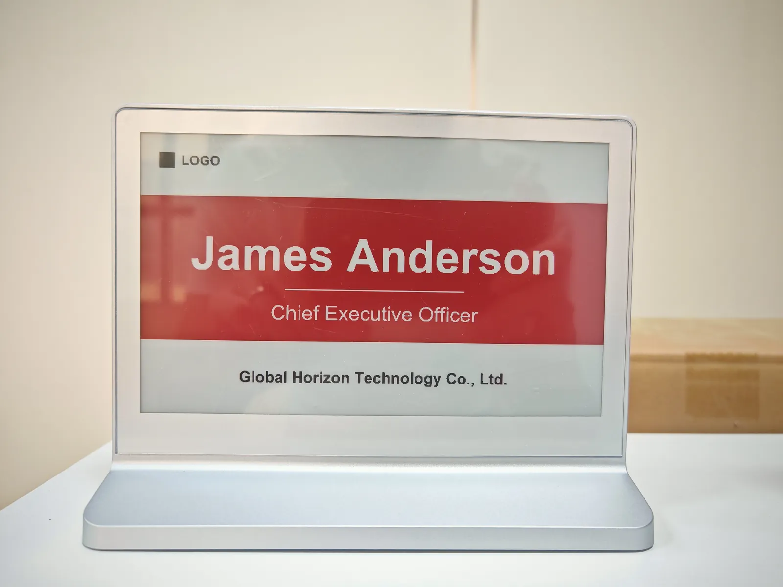 Canvas Desk Sign 7.5 · 4-Color: Red name card on the silver base, front view.